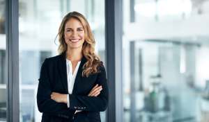 Shot of a confident young businesswoman standing in a modern office