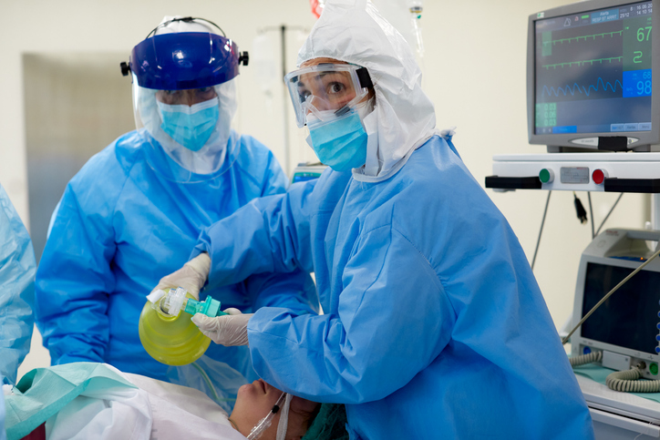Respiratory Therapist Career Guide: Become an RT Emergency room, healthcare workers using a manual medical ventilator on a patient