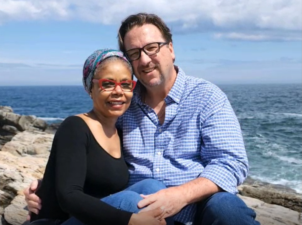 There’s No Right Age to be a Travel Nurse Debbie and her husband posing on the coast of Maine