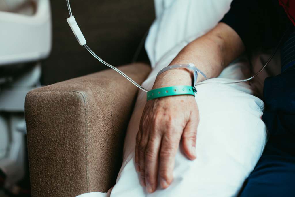 September Health Awareness Days 2022 Elderly male patient hand in hospital