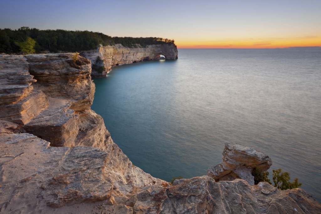 Unique Places to Visit in Michigan Image of Grand Portal Point in Pictured Rock National Lakeshore, Michigan, USA.