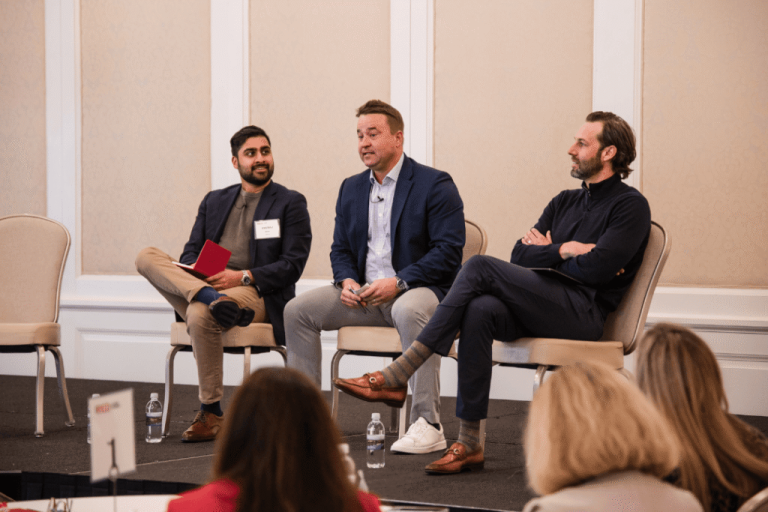 Healthcare leaders in a panel discussion at RED