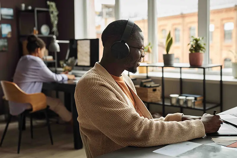 recruiter at desk talking on phone