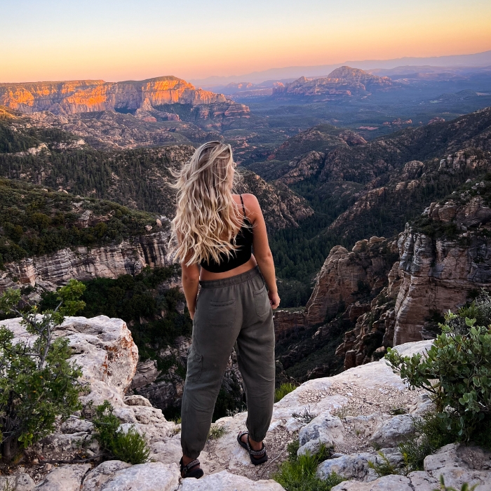 healthcare traveler on cliffside
