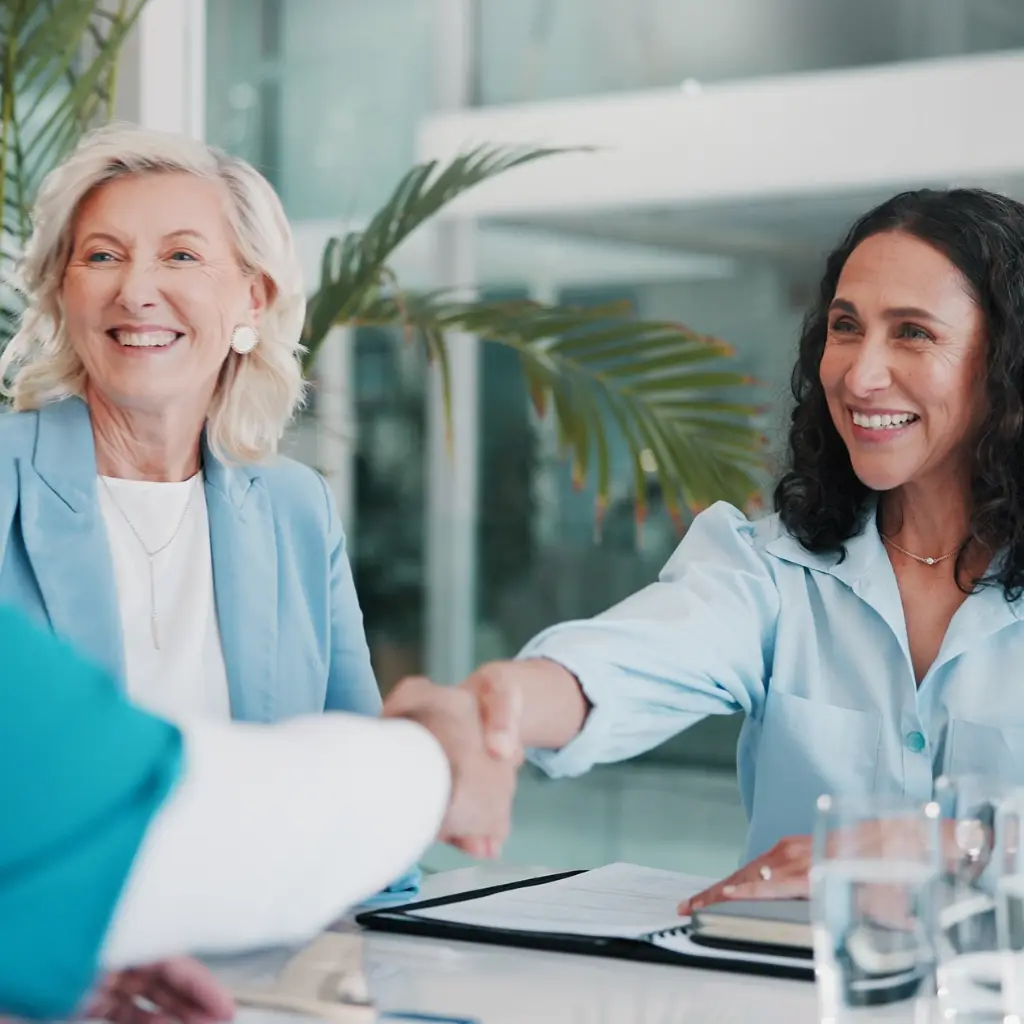 Healthcare professionals meeting and shaking hands